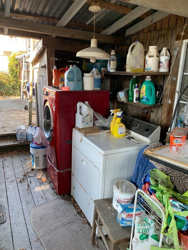 clothes washing area with washer and dryer