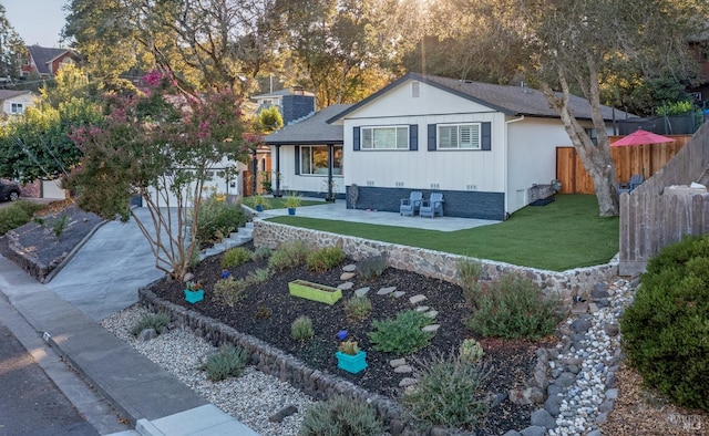 view of front of house with a patio