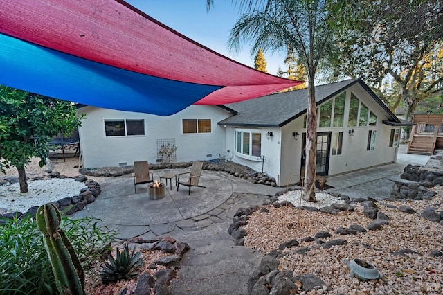 rear view of house featuring a patio