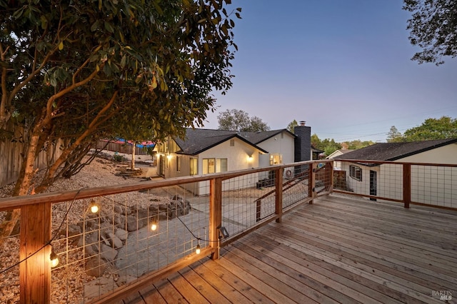 view of deck at dusk