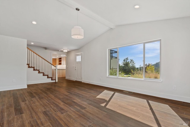 unfurnished living room with vaulted ceiling with beams and dark hardwood / wood-style floors