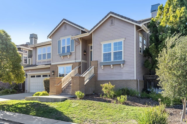 view of front of home with a garage