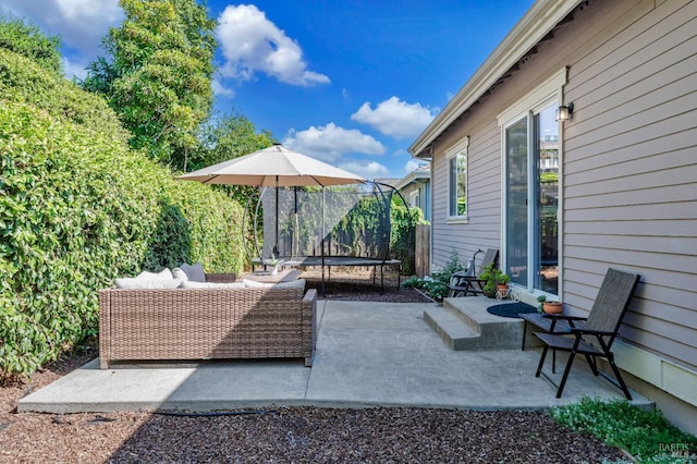 view of patio / terrace with outdoor lounge area and a trampoline