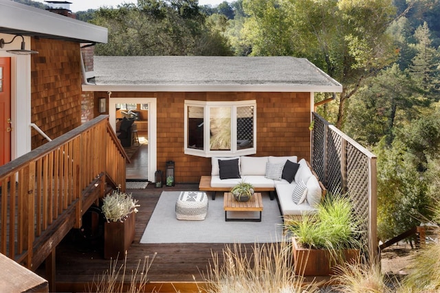 wooden terrace featuring outdoor lounge area