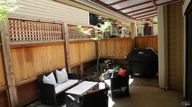 view of patio with a pergola and grilling area