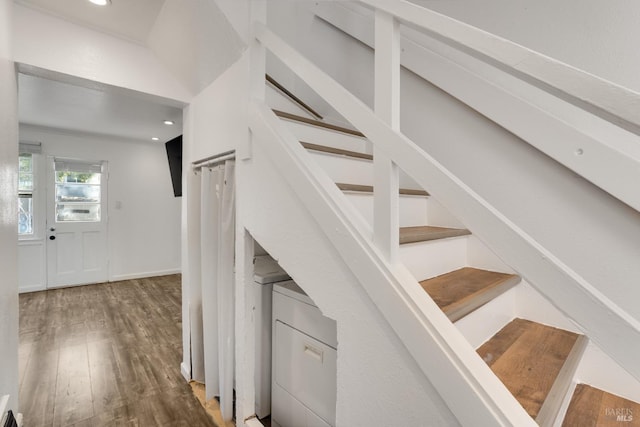 staircase featuring hardwood / wood-style floors