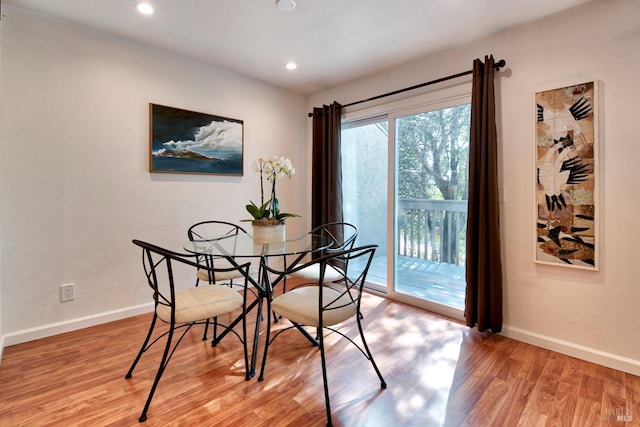 dining space featuring light hardwood / wood-style flooring