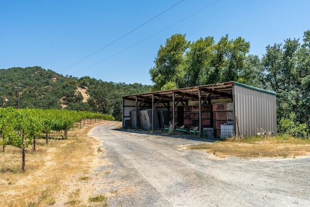 exterior space with a rural view