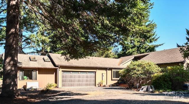 ranch-style home with a garage