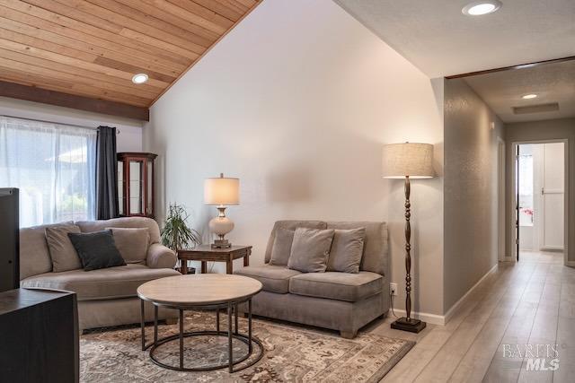 living area with baseboards, wood ceiling, light wood finished floors, recessed lighting, and high vaulted ceiling