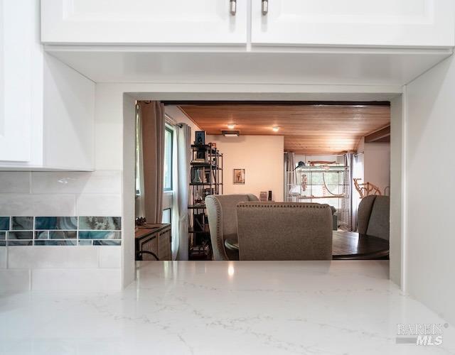 living room with wooden ceiling