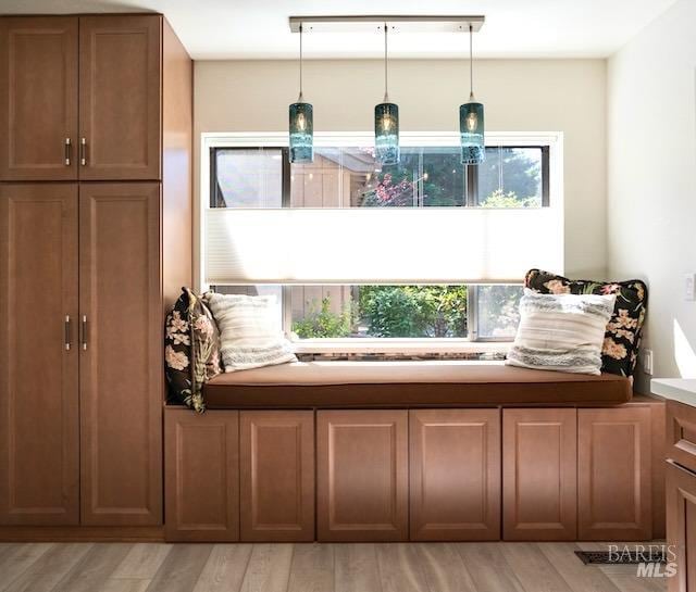 living area with light hardwood / wood-style floors