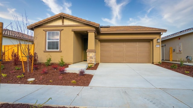 view of front of property featuring a garage