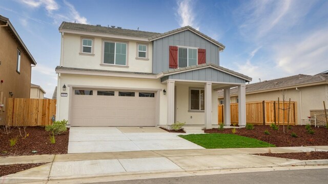 craftsman inspired home with a garage