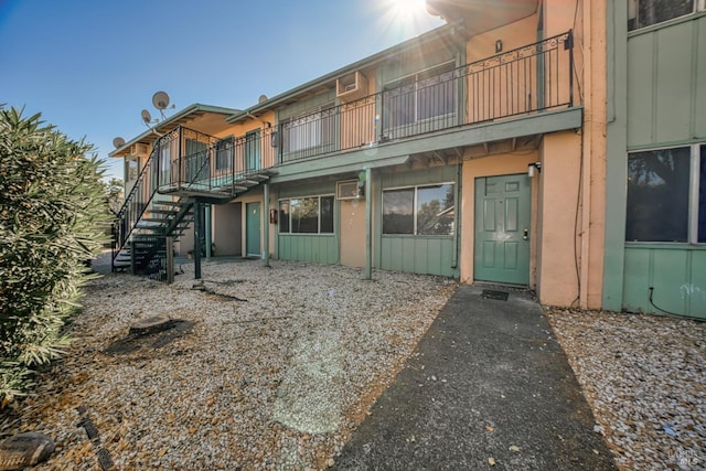 15 Royale Ave, Lakeport, CA 95453 - back of house featuring a wall mounted air conditioner