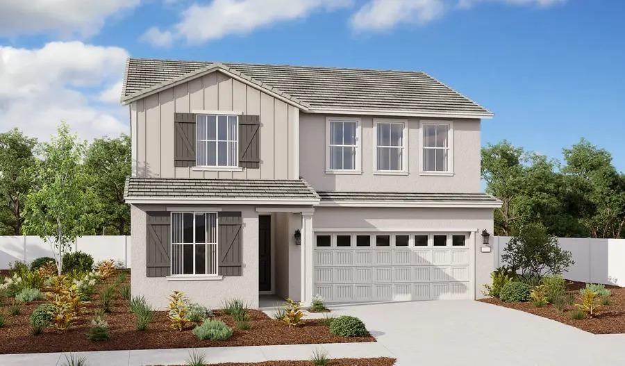 traditional-style home featuring board and batten siding, a garage, fence, and concrete driveway