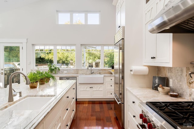 kitchen with extractor fan, plenty of natural light, and sink