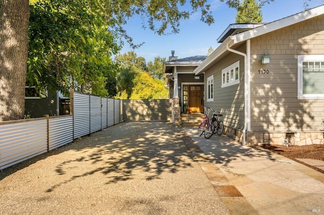 view of property exterior featuring a patio area