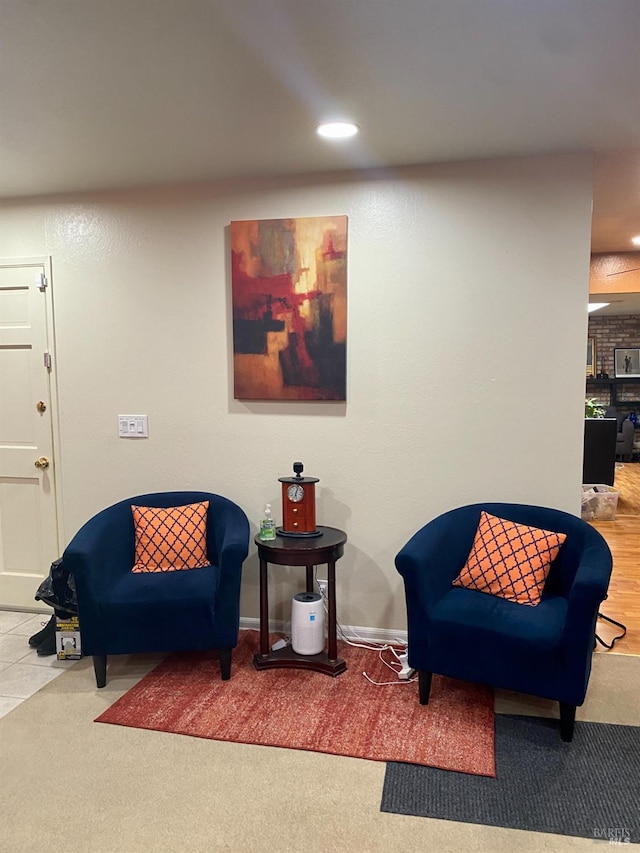 living area featuring carpet flooring