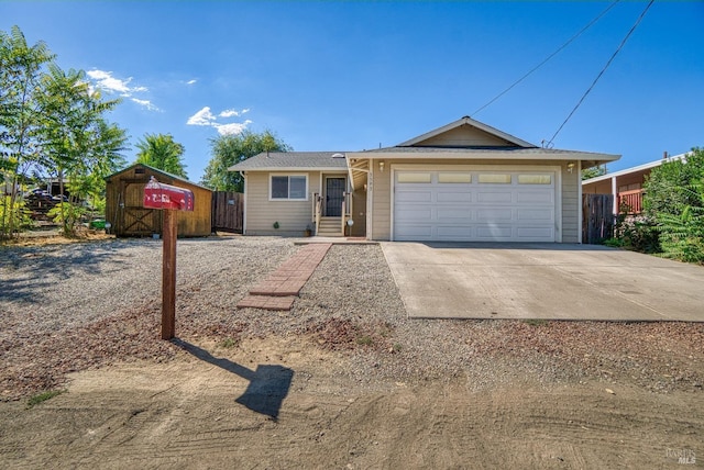 ranch-style house featuring a garage