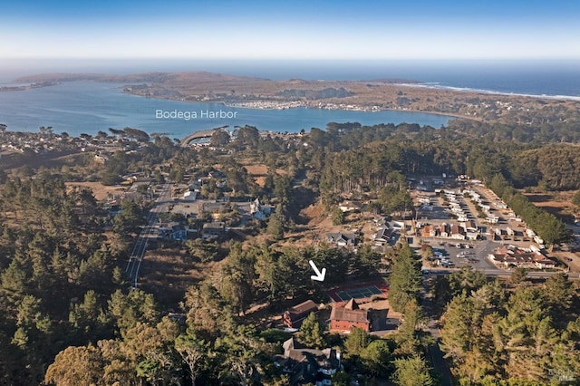 birds eye view of property featuring a water view