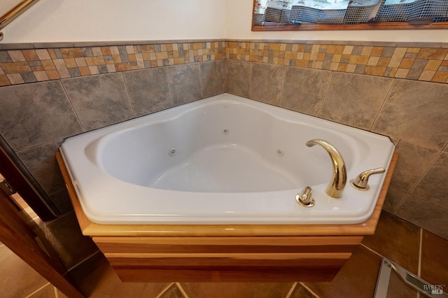 bathroom featuring a washtub