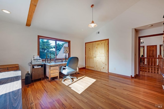 3925 Bay Hill Rd, Bodega Bay, CA 94923 - home office featuring light wood-style floors, vaulted ceiling, visible vents, and baseboards