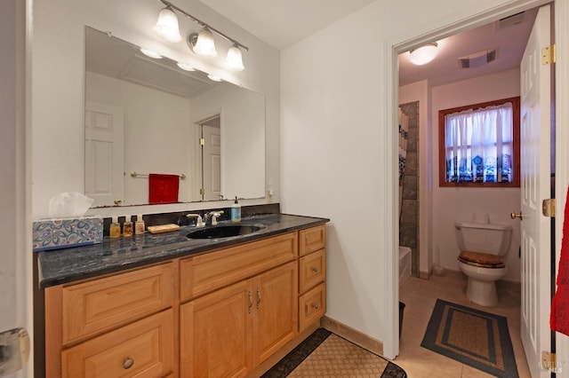 full bathroom featuring shower / bathtub combination with curtain, tile patterned floors, vanity, and toilet