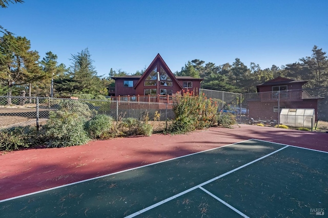 view of sport court featuring basketball court