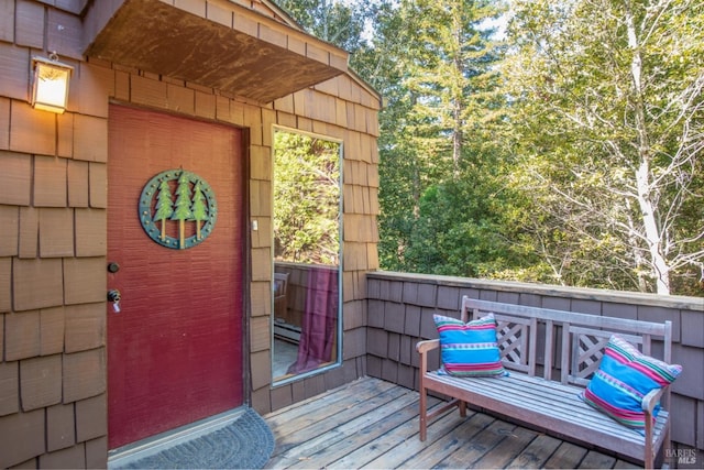 doorway to property with a deck