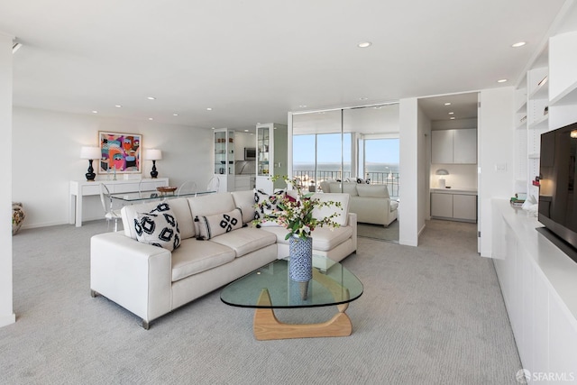 1000 N Point St Unit 807, San Francisco, CA 94109 - living room with recessed lighting, baseboards, and light colored carpet
