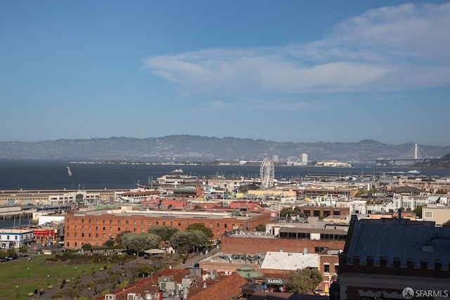 city view featuring a water and mountain view