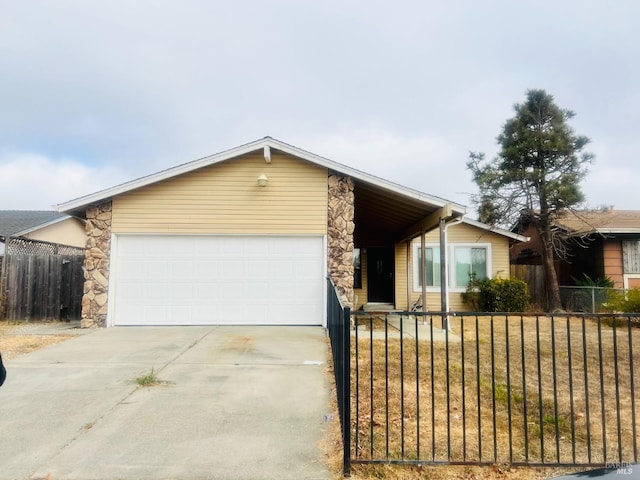 ranch-style house with a front yard and a garage