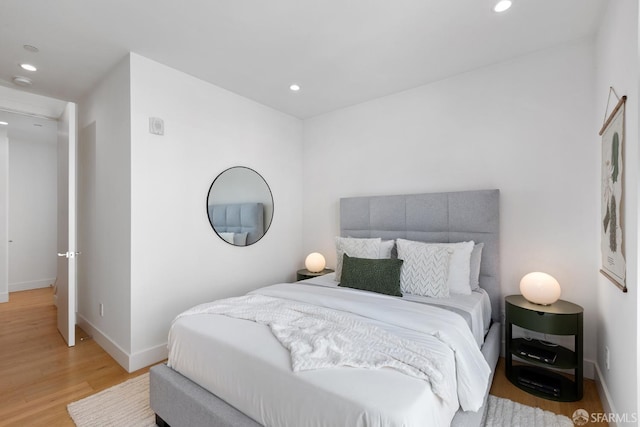 bedroom featuring light hardwood / wood-style floors