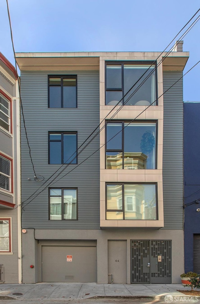 view of property featuring a garage