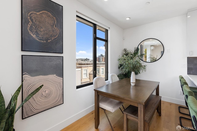 dining area featuring light hardwood / wood-style flooring