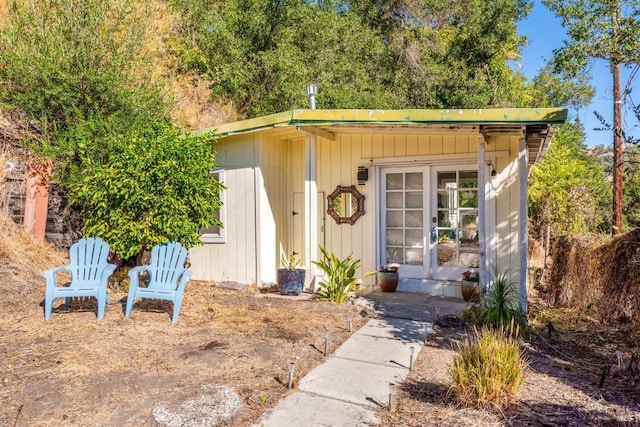 entrance to property featuring french doors