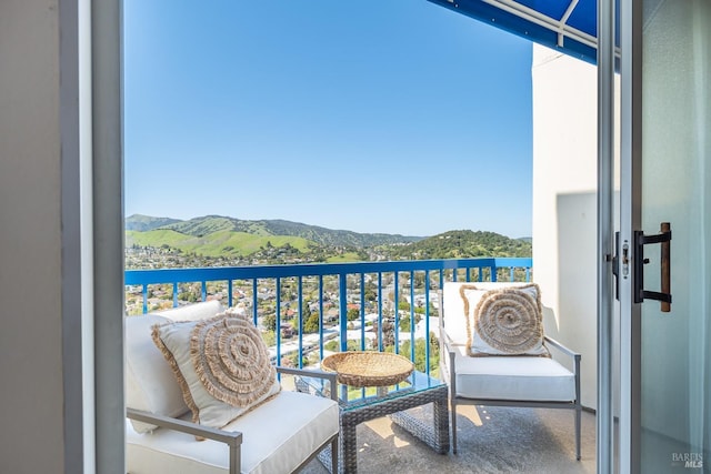 balcony featuring a mountain view