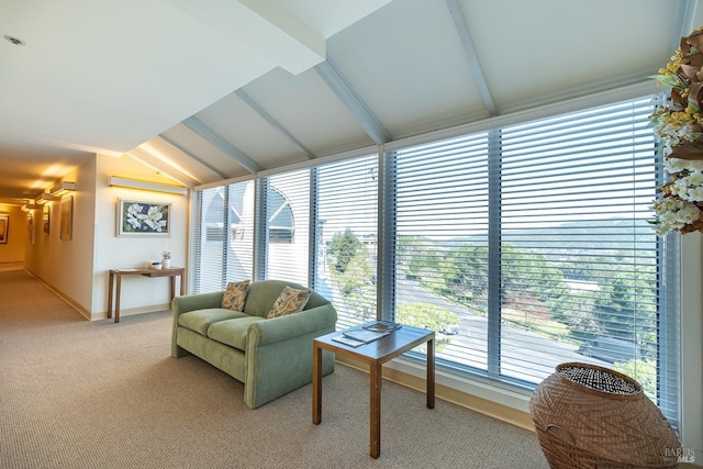 interior space featuring lofted ceiling with beams