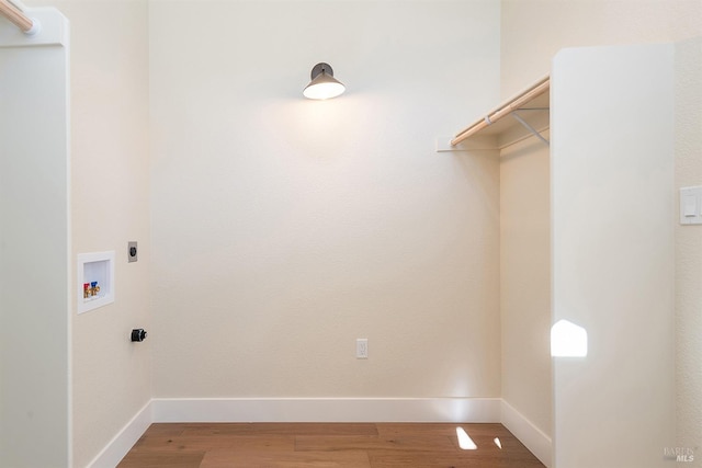 laundry room featuring washer hookup, hookup for an electric dryer, and hardwood / wood-style flooring