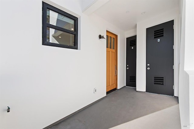 interior space featuring concrete flooring