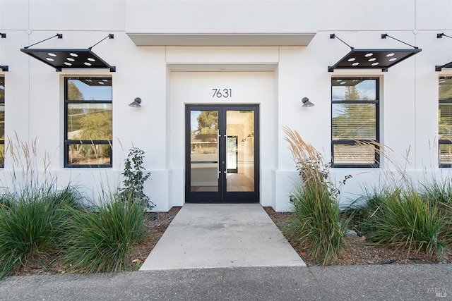 doorway to property featuring french doors