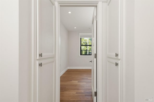 hall with light hardwood / wood-style flooring