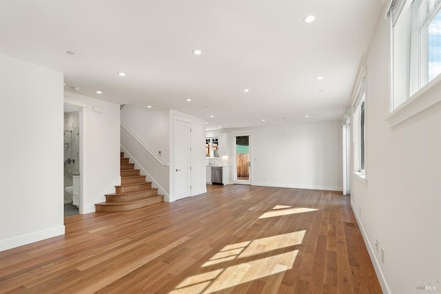 unfurnished living room featuring light hardwood / wood-style floors