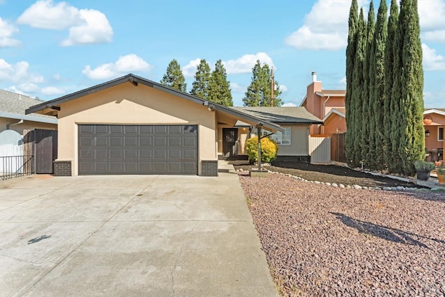 ranch-style house featuring a garage