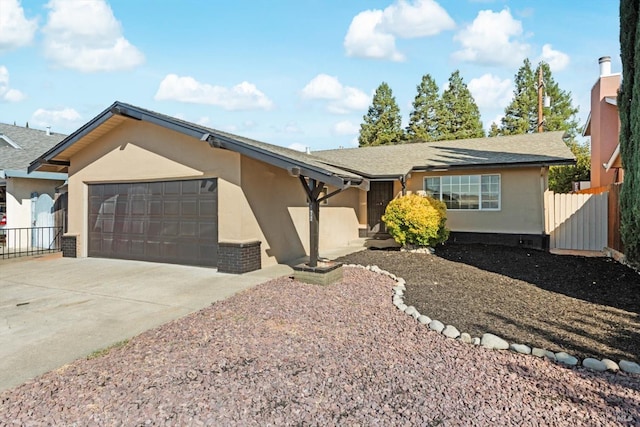 ranch-style home with a garage