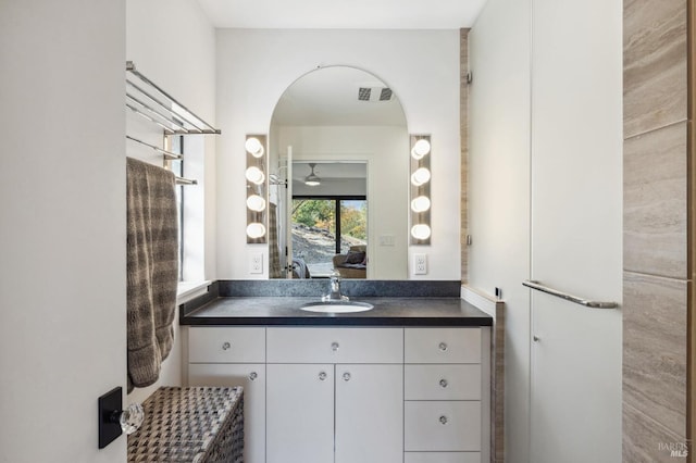 bathroom featuring vanity and ceiling fan