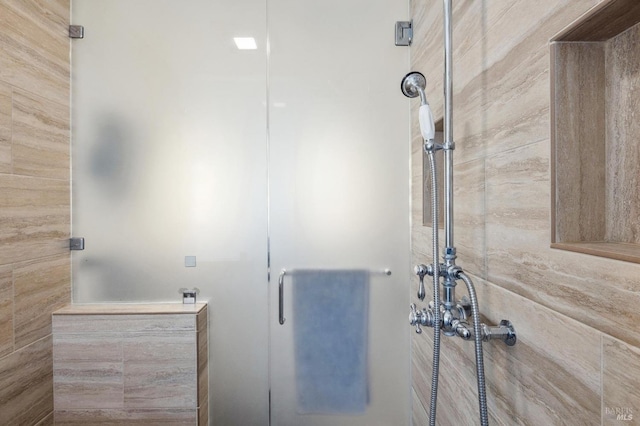 bathroom with an enclosed shower