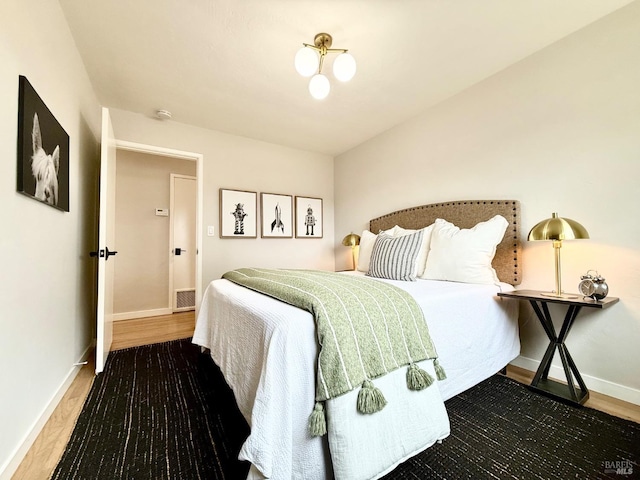 bedroom featuring hardwood / wood-style floors