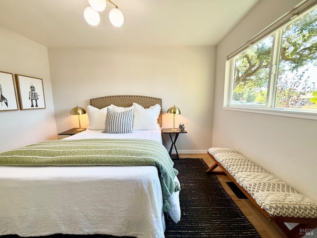 bedroom featuring hardwood / wood-style flooring